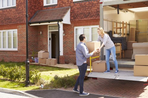 Local movers handling apartment furniture and boxes in Richmond