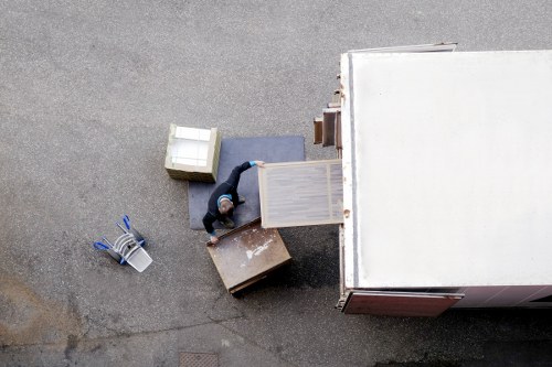 Removal team handling a same day move in Richmond residential street