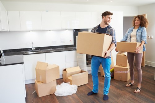 Team separating office waste and reusable furniture for recycling in Richmond