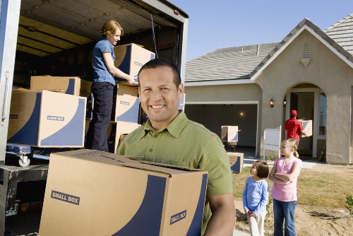 Local movers packing contents for a family house in Richmond